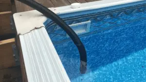 Siphoning water from the pool